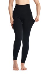 Photo of Woman wearing black sports leggings on white background, closeup