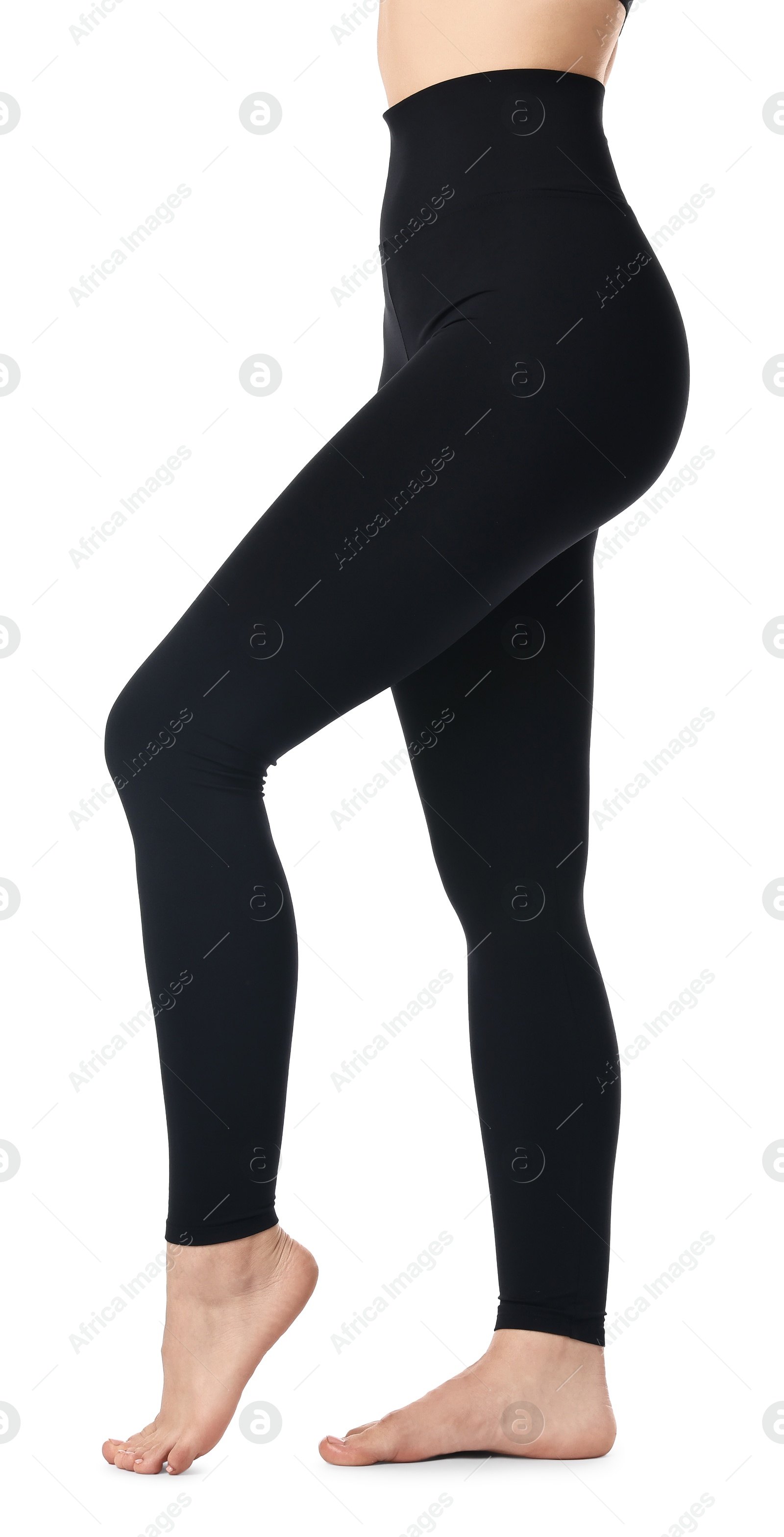 Photo of Woman wearing black sports leggings on white background, closeup