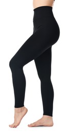 Photo of Woman wearing black sports leggings on white background, closeup