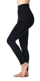 Photo of Woman wearing black sports leggings on white background, closeup