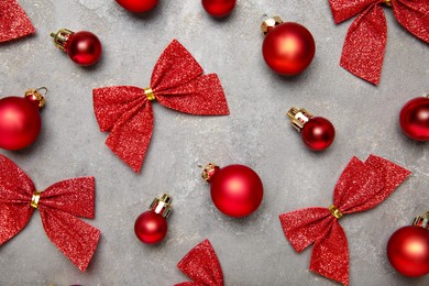 Photo of Flat lay composition with Christmas decor on gray textured table