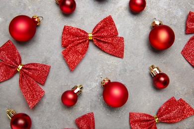 Photo of Flat lay composition with Christmas decor on gray textured table