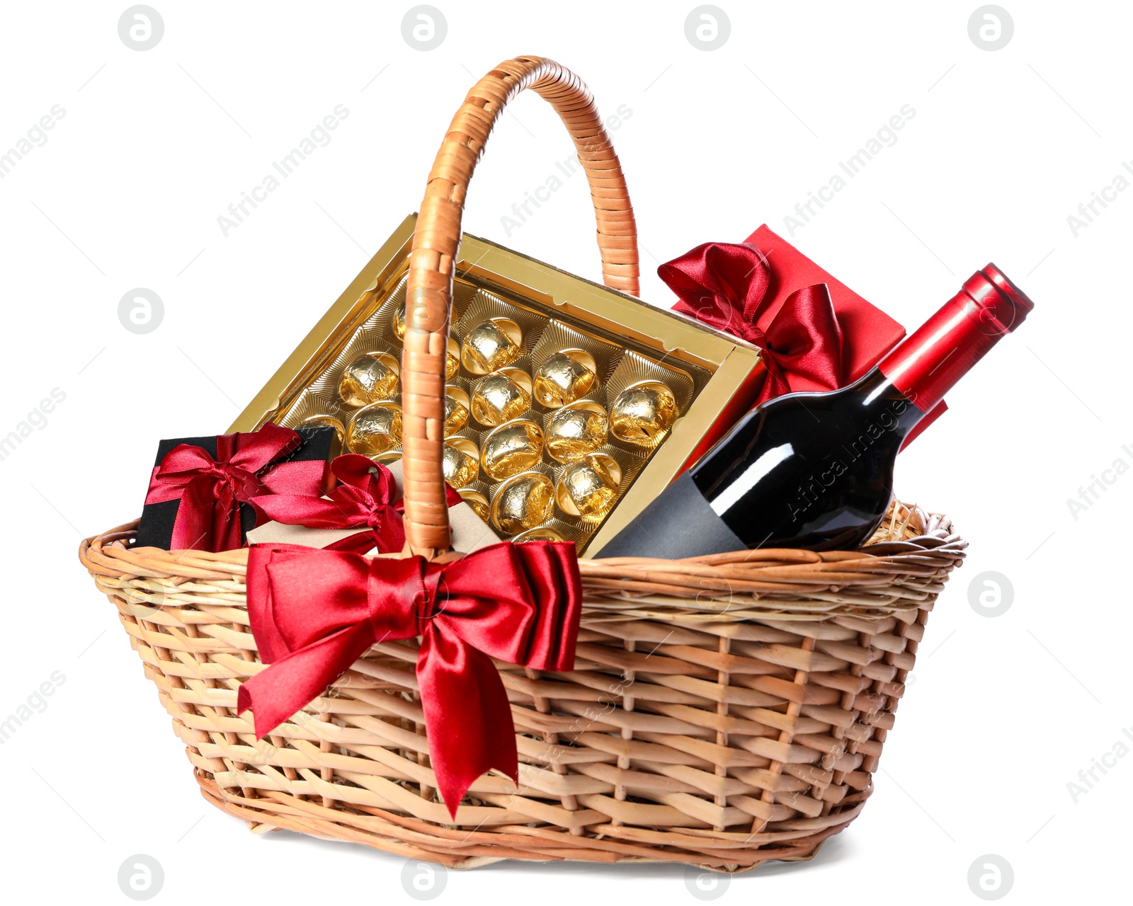 Photo of Wicker gift basket with wine isolated on white