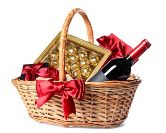 Photo of Wicker gift basket with wine isolated on white