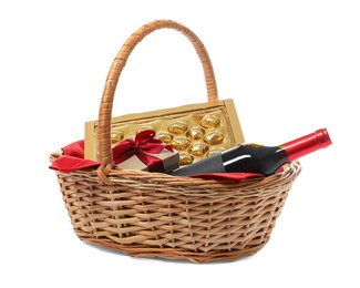 Wicker gift basket with wine isolated on white