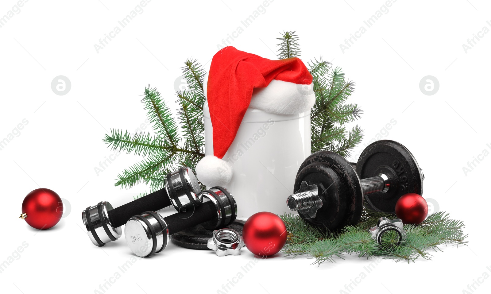 Photo of Dumbbells, container with supplement and Christmas decor isolated on white