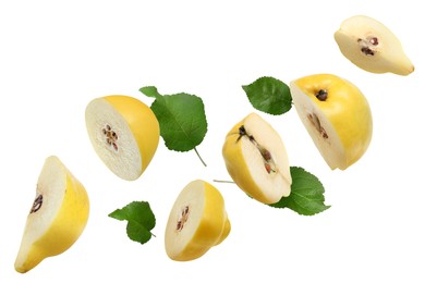 Image of Pieces of fresh quinces and green leaves flying on white background