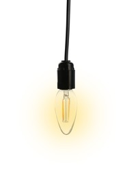 Image of One glowing light bulb hanging on white background