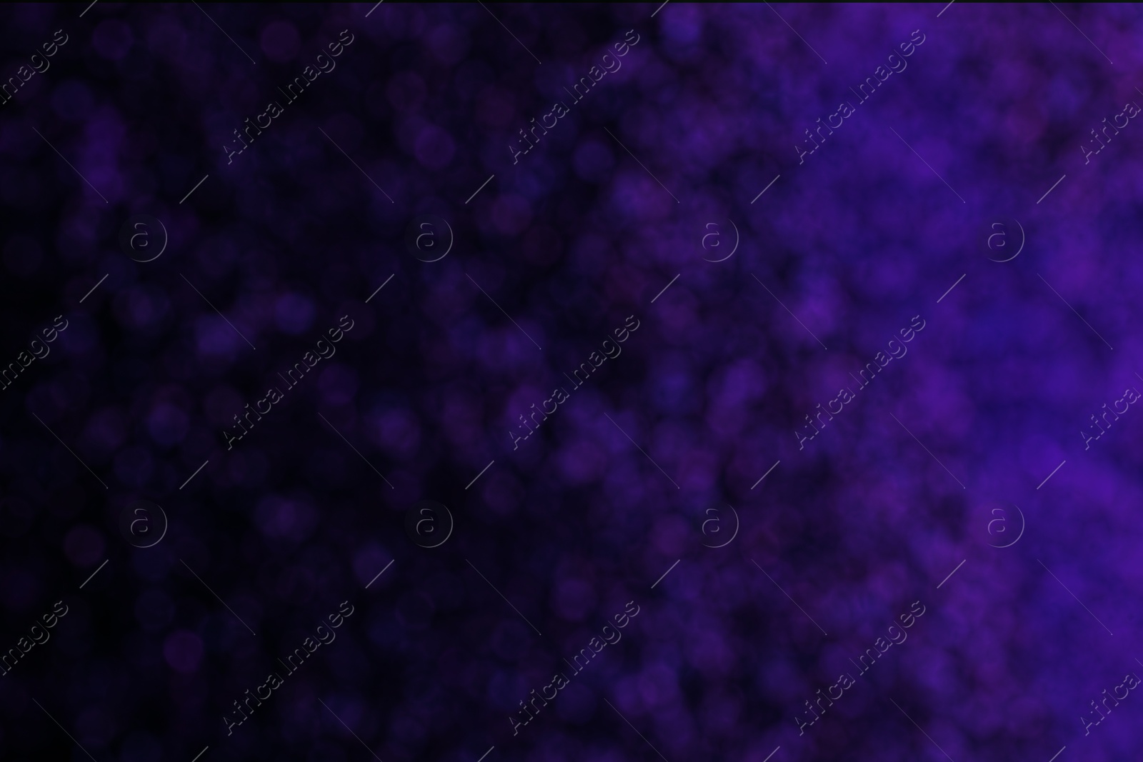 Image of Purple and black gradient backdrop, bokeh effect. Halloween background