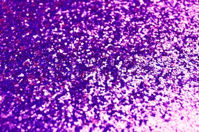 Shiny violet blue glitter, closeup. Halloween background