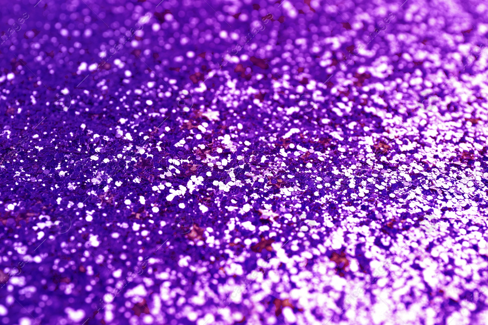 Image of Shiny violet blue glitter, closeup. Halloween background