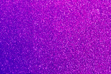 Image of Shiny violet and blue glitter, top view. Halloween background