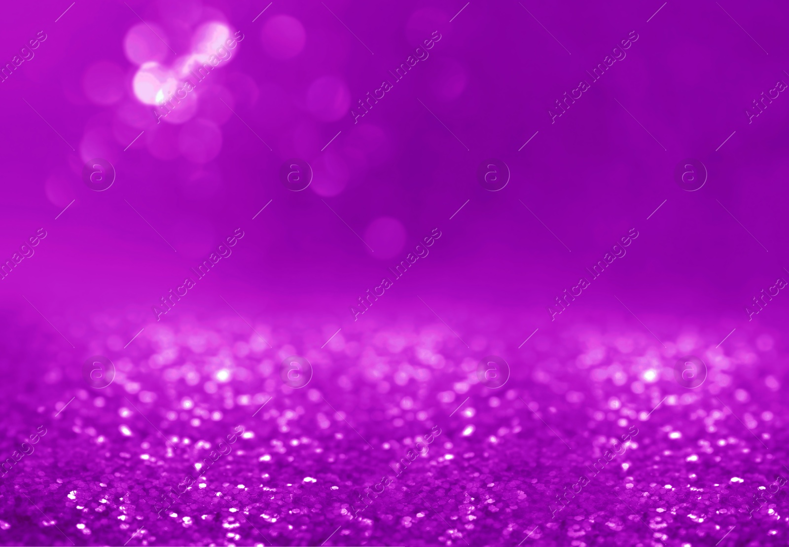 Image of Shiny violet glitter, closeup. Halloween background, bokeh effect