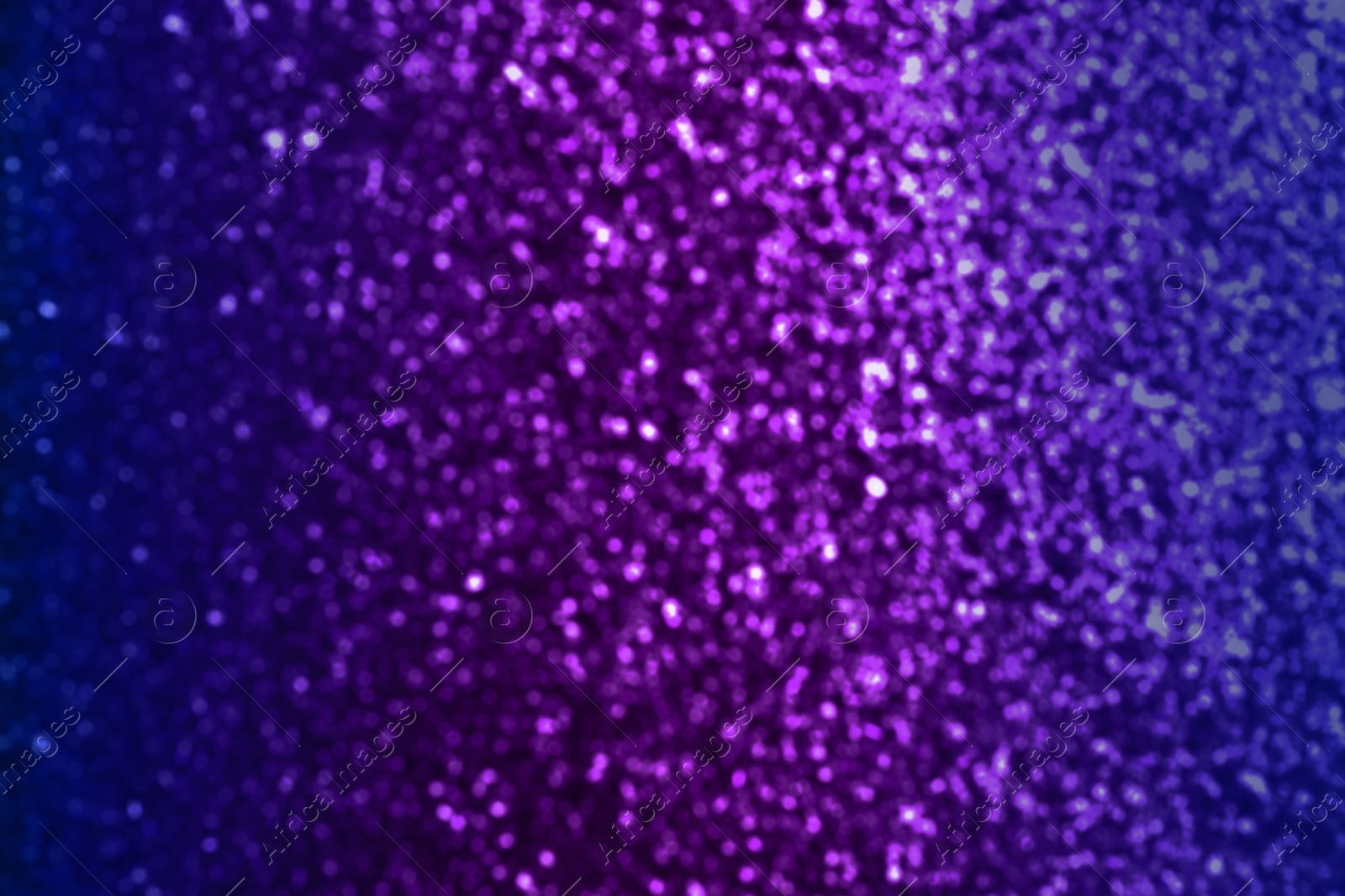 Image of Shiny purple and blue glitter, bokeh effect. Halloween background