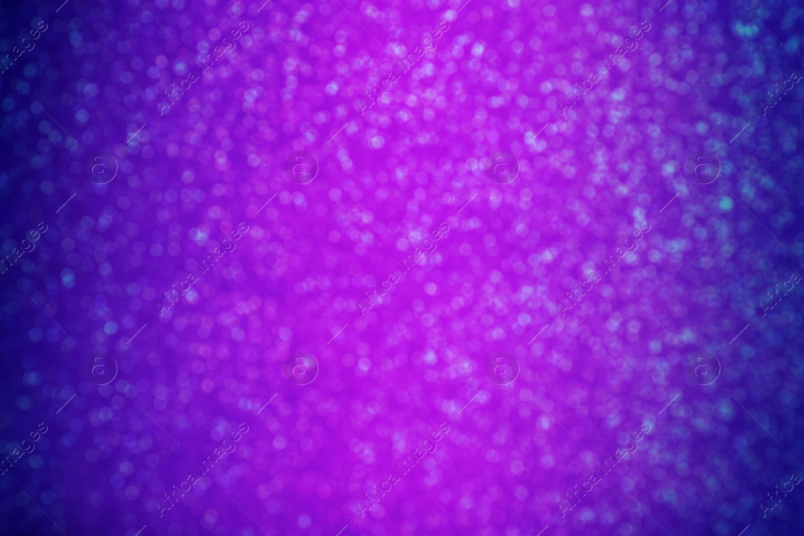 Image of Shiny violet and blue glitter, bokeh effect. Halloween background