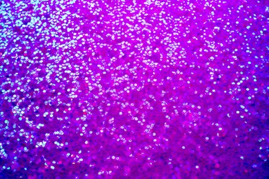 Shiny violet and blue glitter. Halloween background