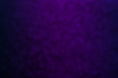 Image of Purple and black gradient backdrop. Halloween background