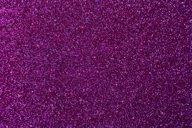 Shiny purple glitter, top view. Halloween background