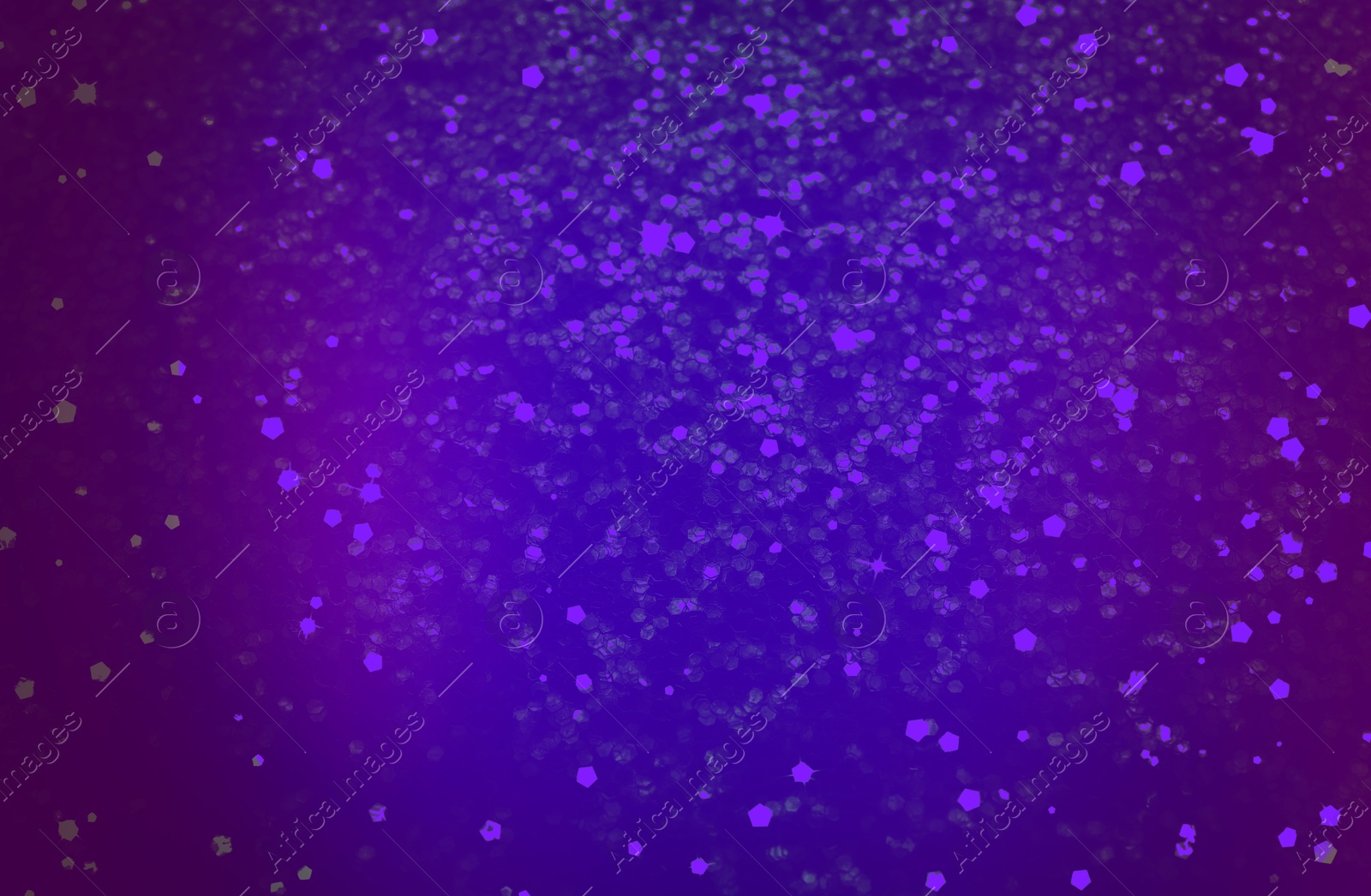 Image of Shiny violet and blue gradient glitter. Halloween background