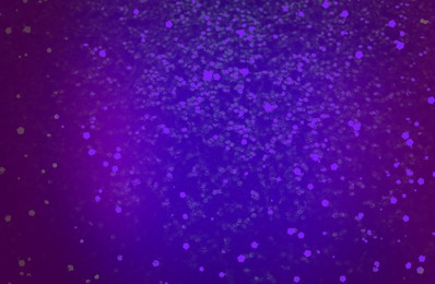 Image of Shiny violet and blue gradient glitter. Halloween background