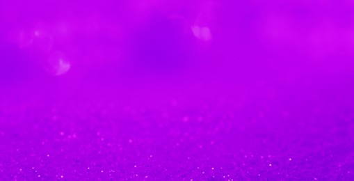 Image of Shiny violet glitter, closeup. Halloween background, banner design