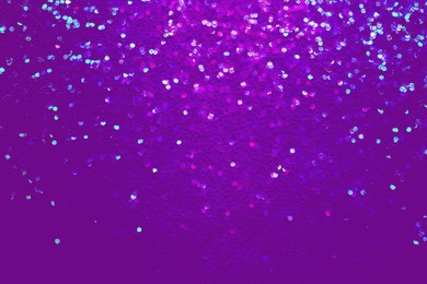 Shiny violet and blue glitter, top view. Halloween background