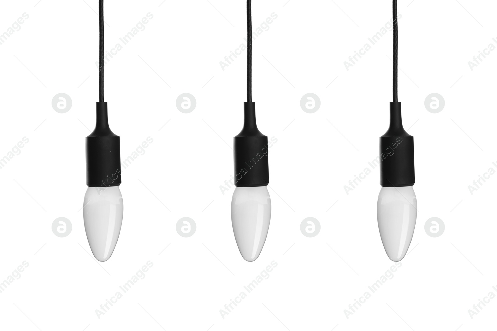 Image of Three incandescent light bulbs on white background