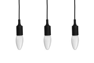 Image of Three incandescent light bulbs on white background