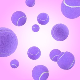 Image of Many violet tennis balls flying on pink gradient background