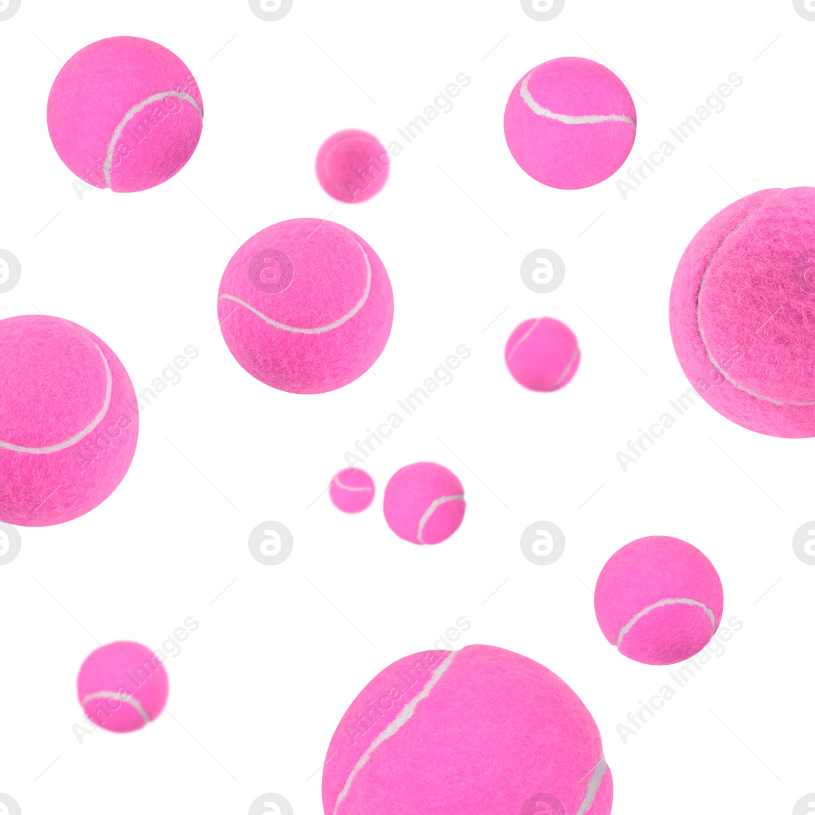 Image of Many pink tennis balls flying on white background