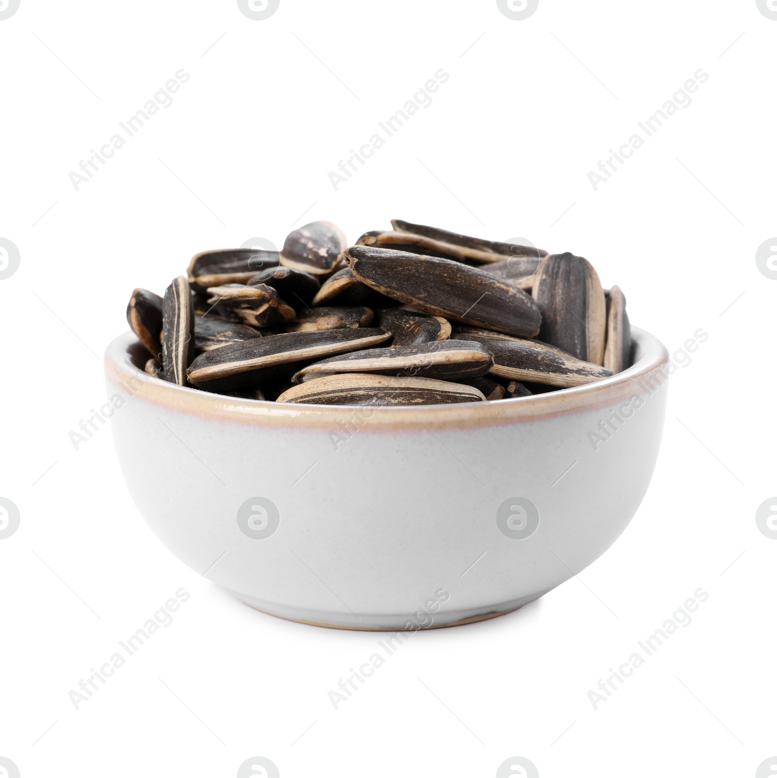 Photo of Sunflower seeds in bowl isolated on white