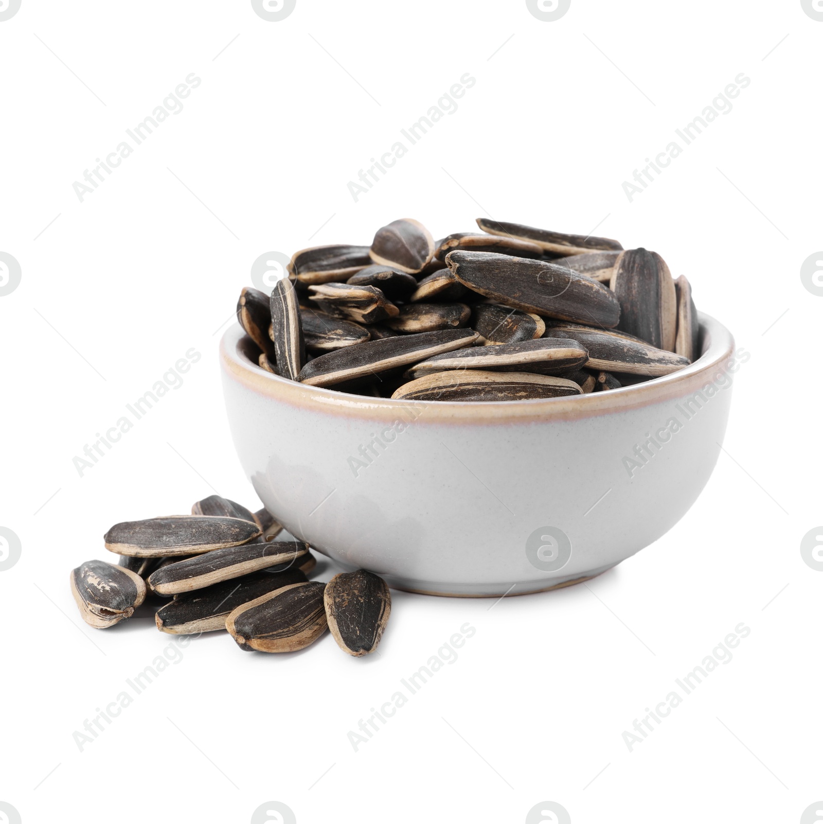 Photo of Sunflower seeds in bowl isolated on white