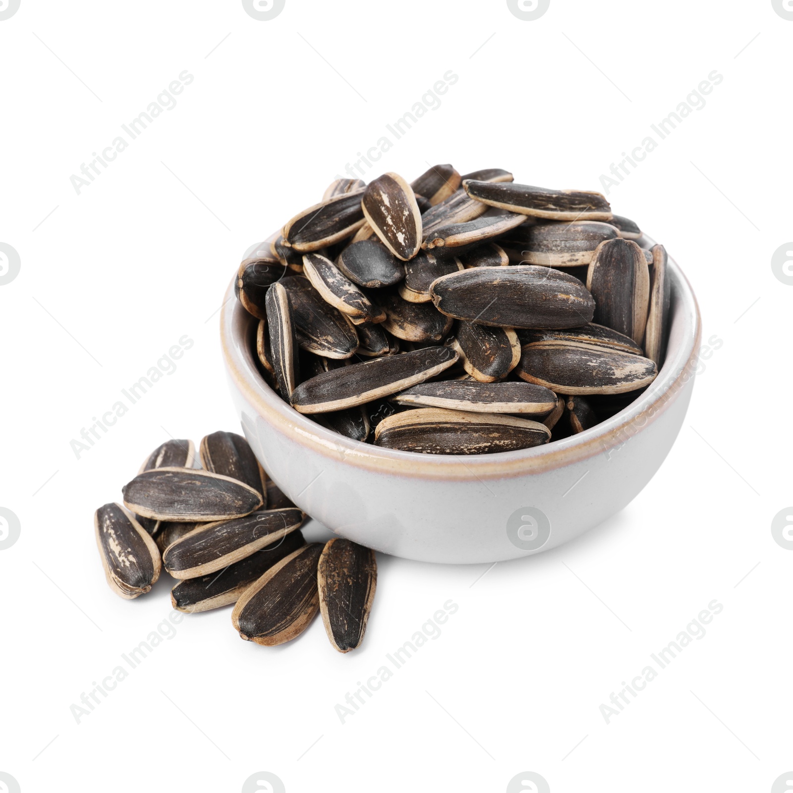 Photo of Sunflower seeds in bowl isolated on white