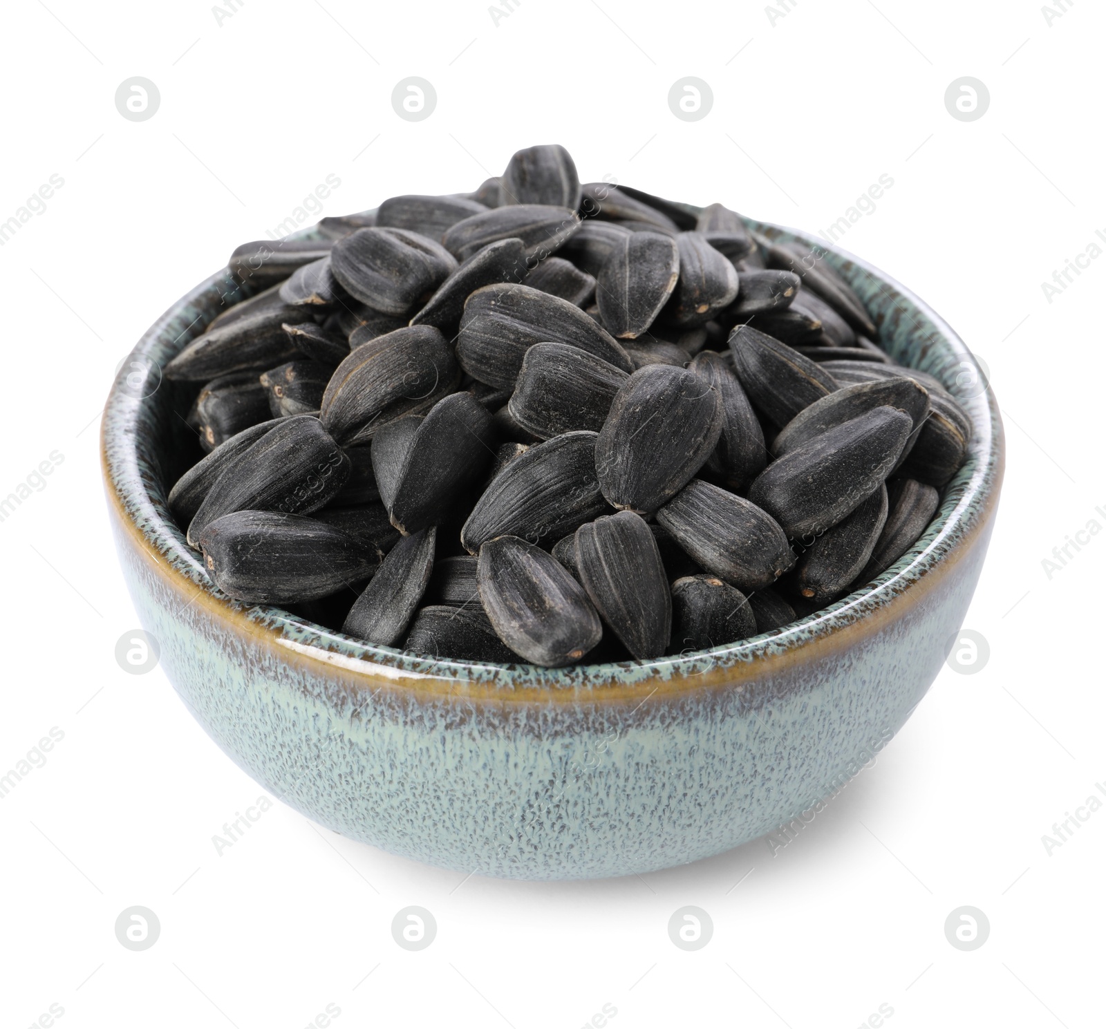 Photo of Sunflower seeds in bowl isolated on white