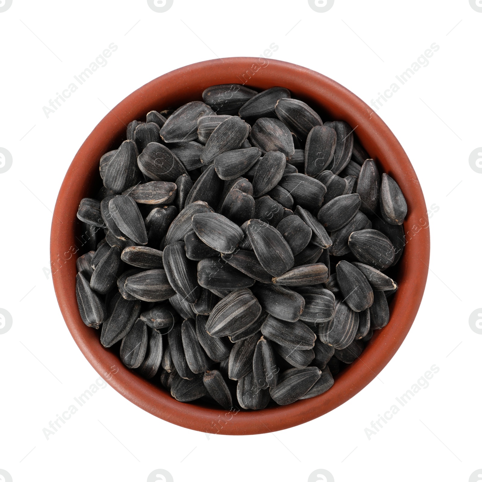 Photo of Sunflower seeds in bowl isolated on white, top view