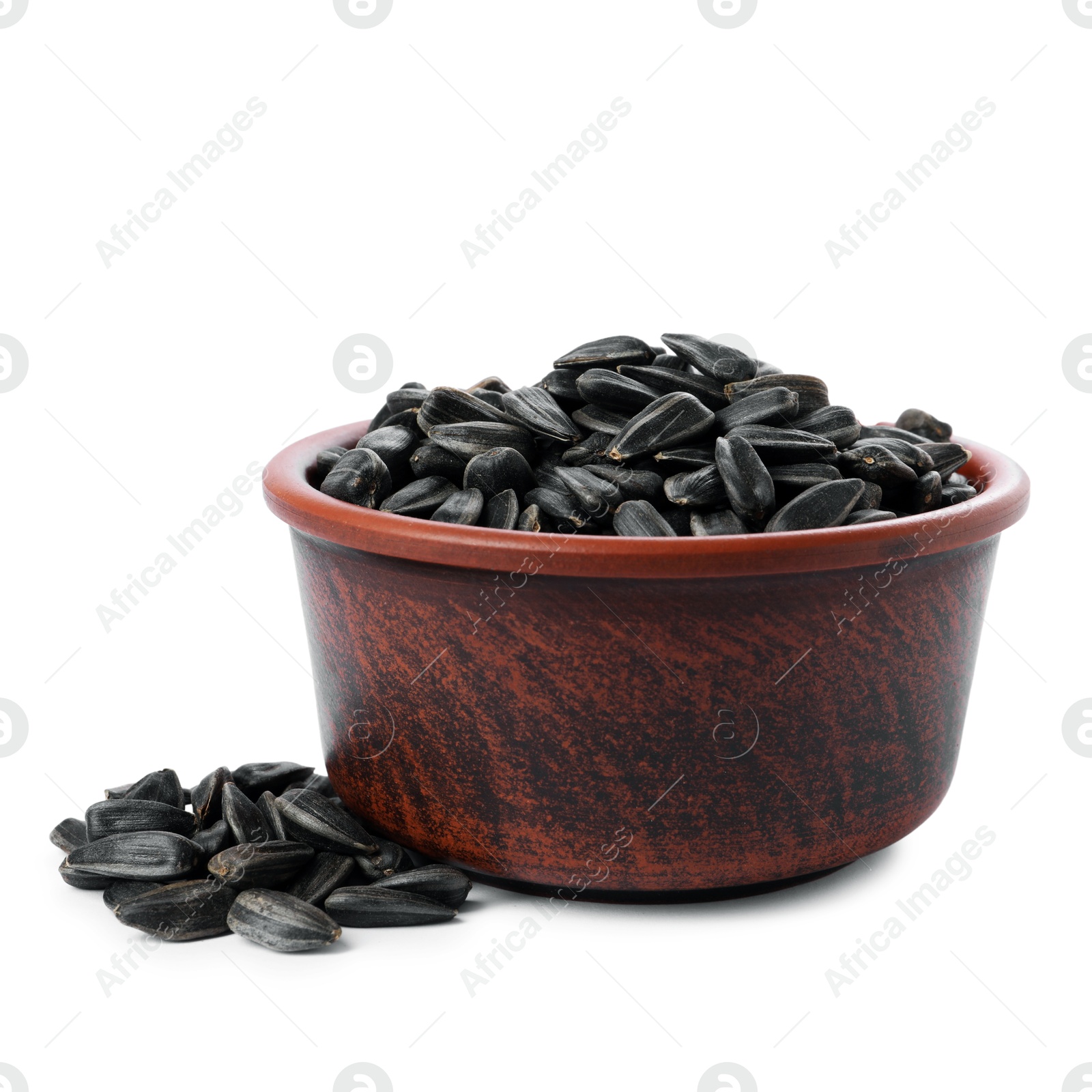 Photo of Sunflower seeds in bowl isolated on white