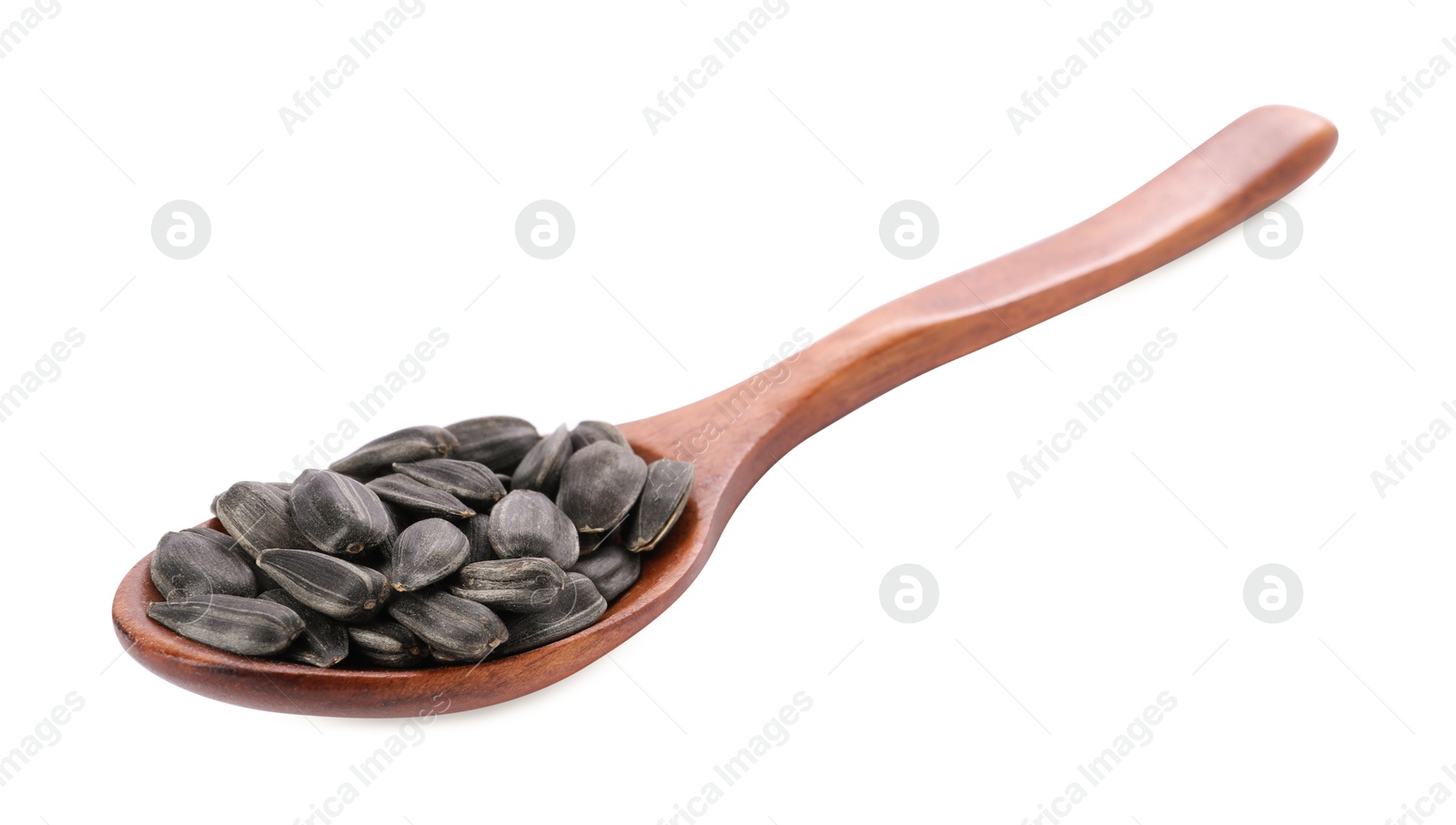 Photo of Sunflower seeds in wooden spoon isolated on white