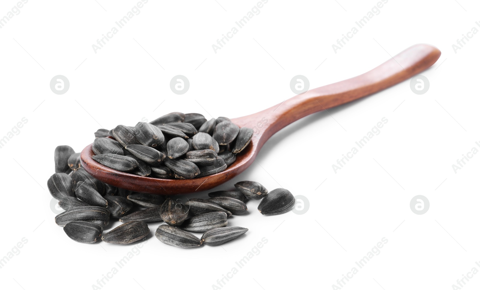 Photo of Sunflower seeds in wooden spoon isolated on white