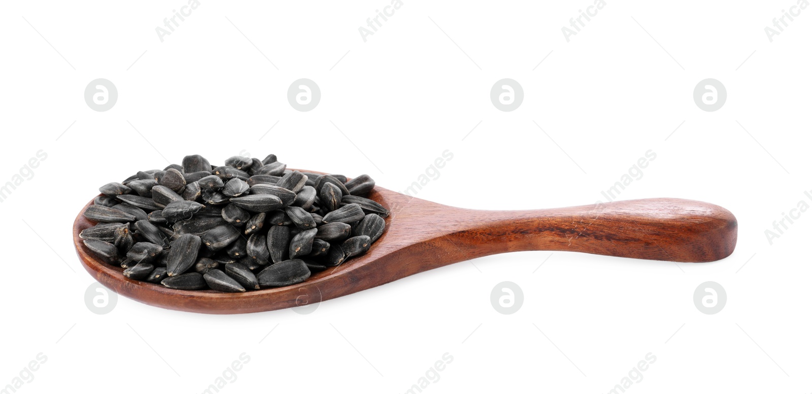 Photo of Sunflower seeds in wooden spoon isolated on white