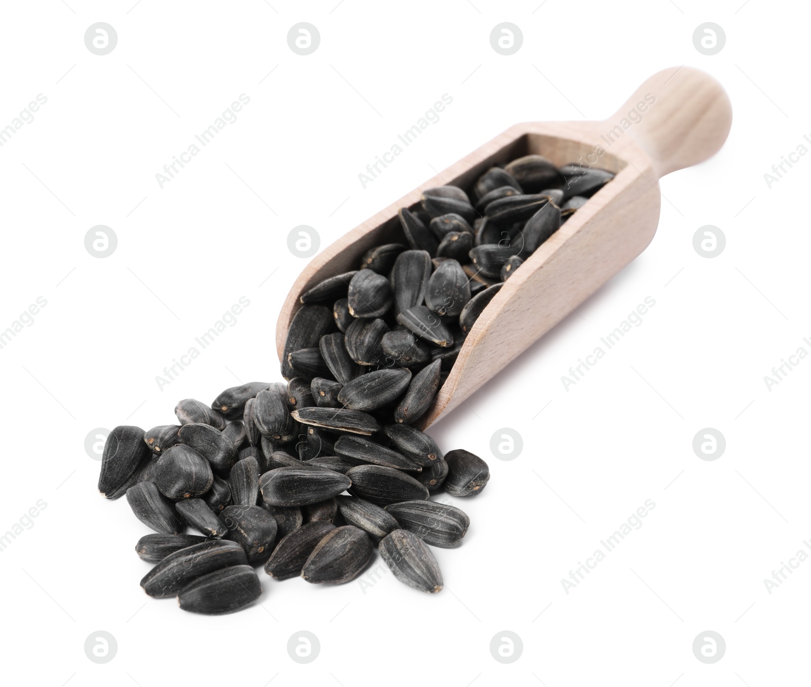 Photo of Sunflower seeds in wooden scoop isolated on white