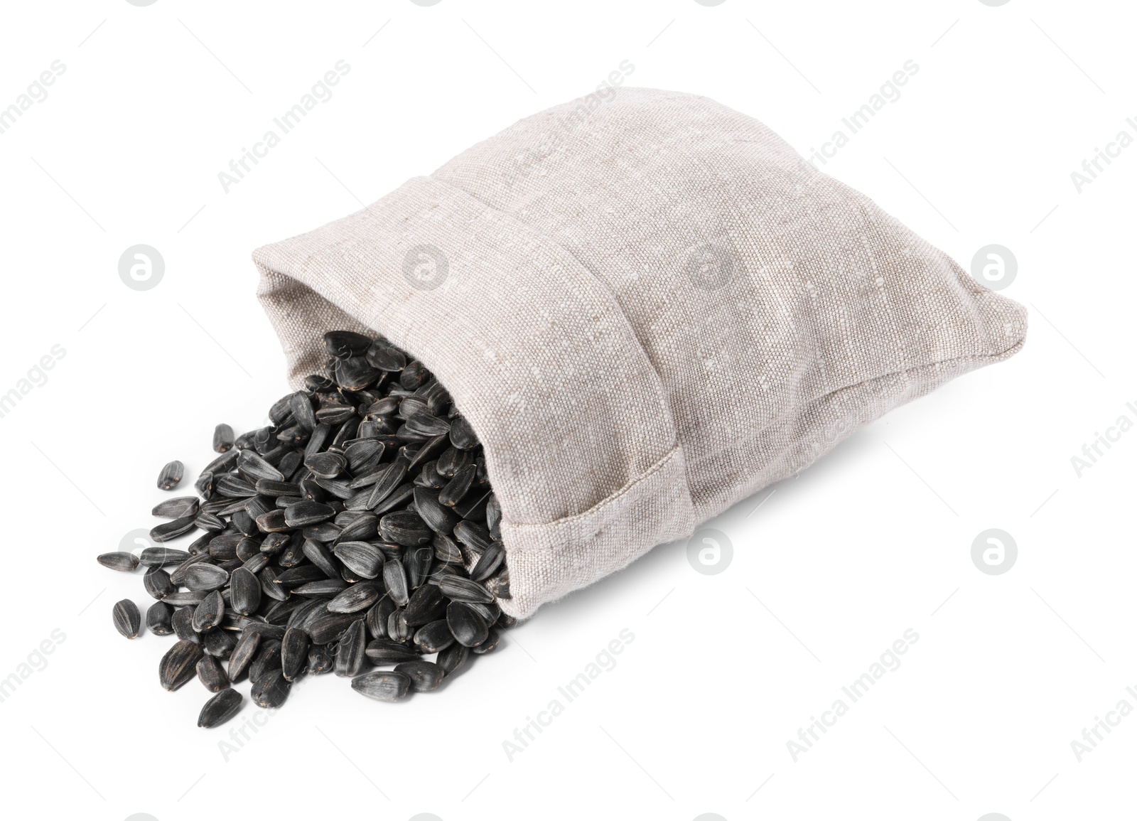 Photo of Sunflower seeds and overturned burlap sack isolated on white