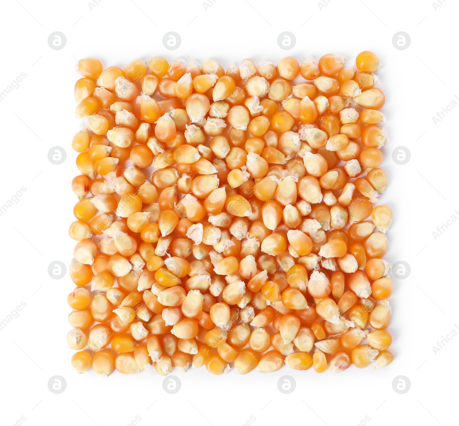 Photo of Pile of fresh corn kernels isolated on white, top view