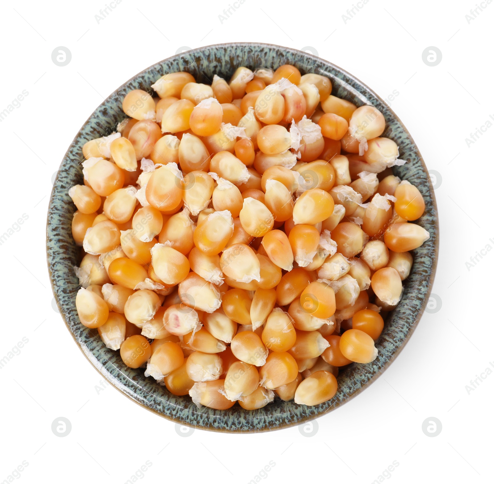 Photo of Fresh corn kernels in bowl isolated on white, top view