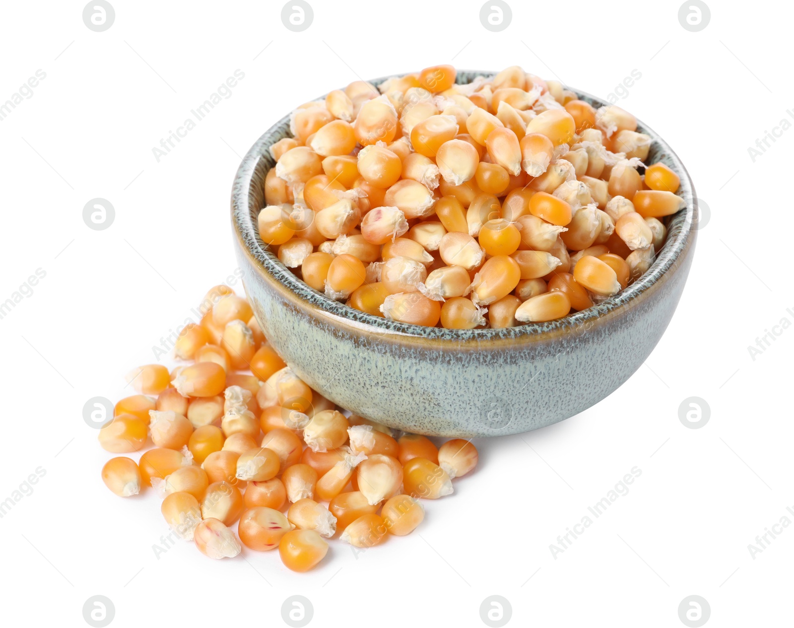 Photo of Fresh corn kernels in bowl isolated on white