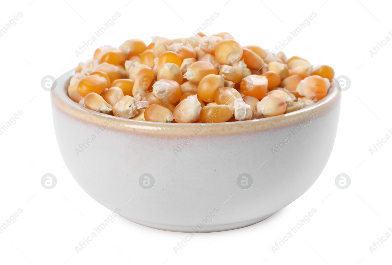 Photo of Fresh corn kernels in bowl isolated on white