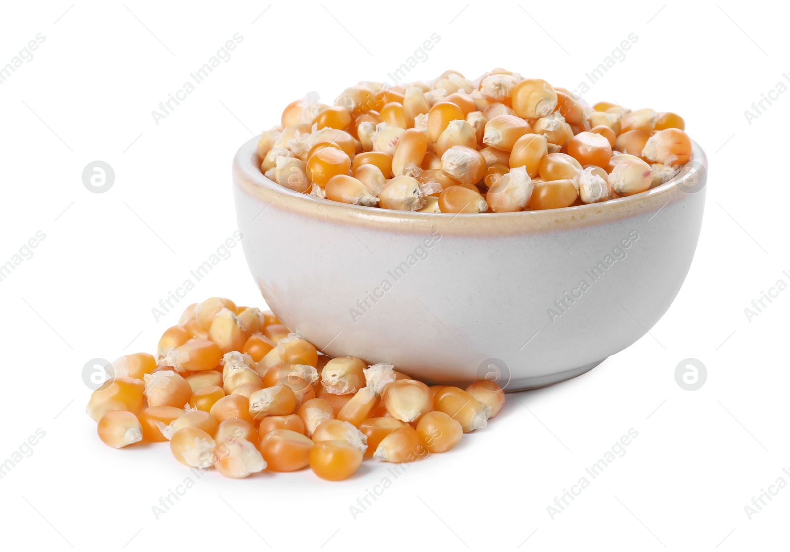 Photo of Fresh corn kernels in bowl isolated on white