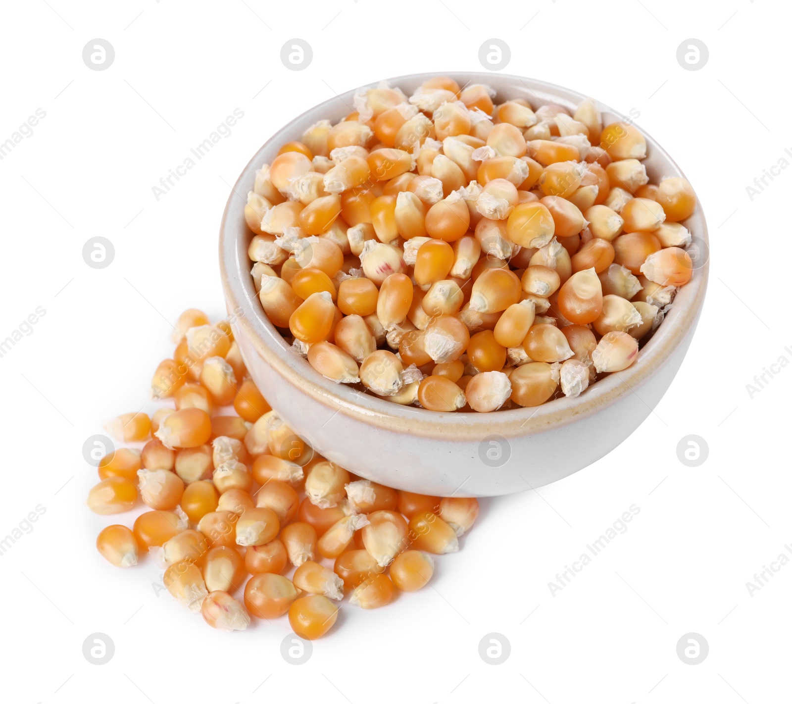 Photo of Fresh corn kernels in bowl isolated on white