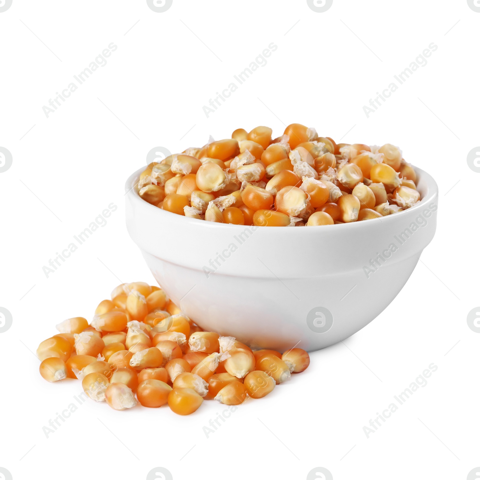 Photo of Fresh corn kernels in bowl isolated on white