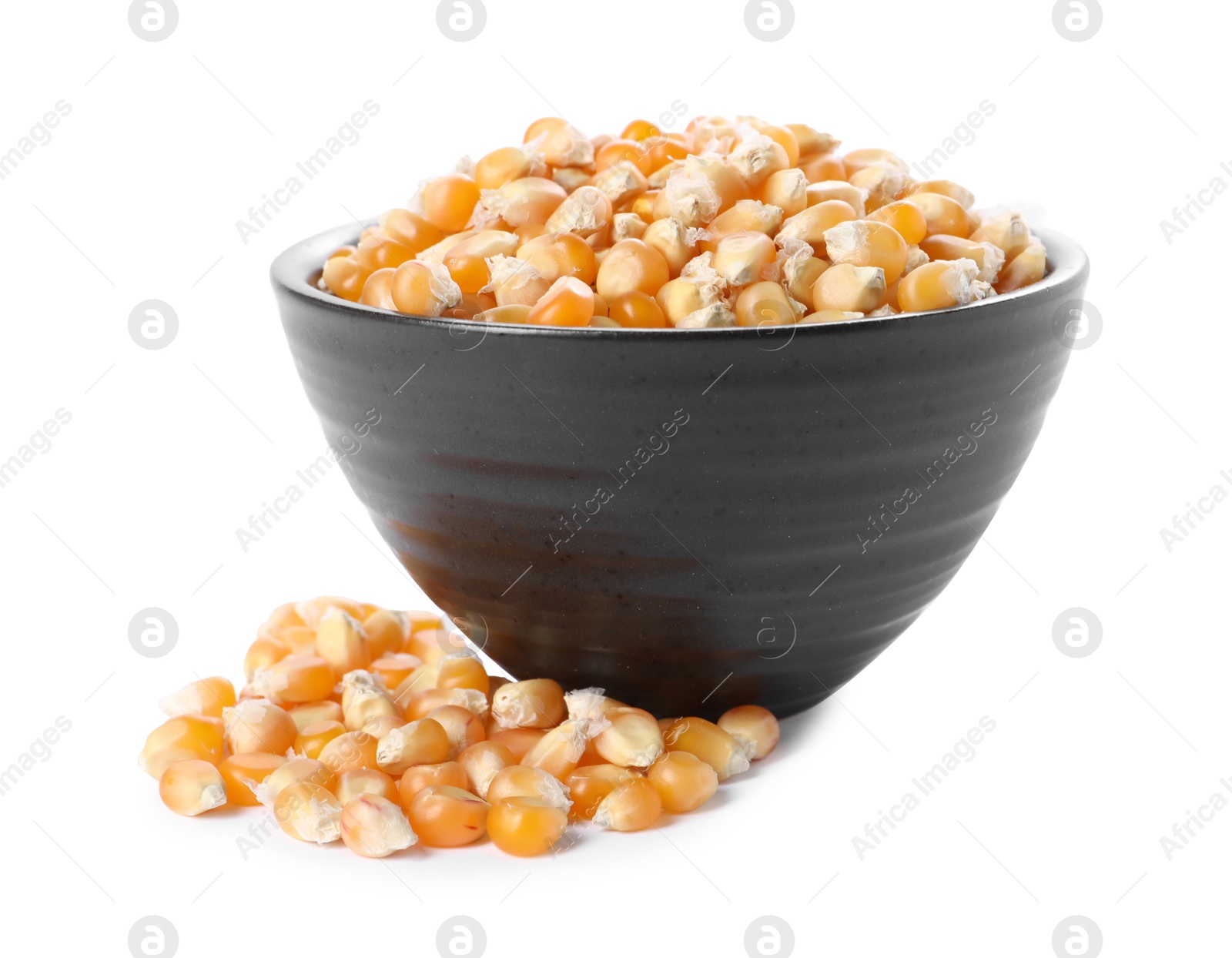 Photo of Fresh corn kernels in bowl isolated on white