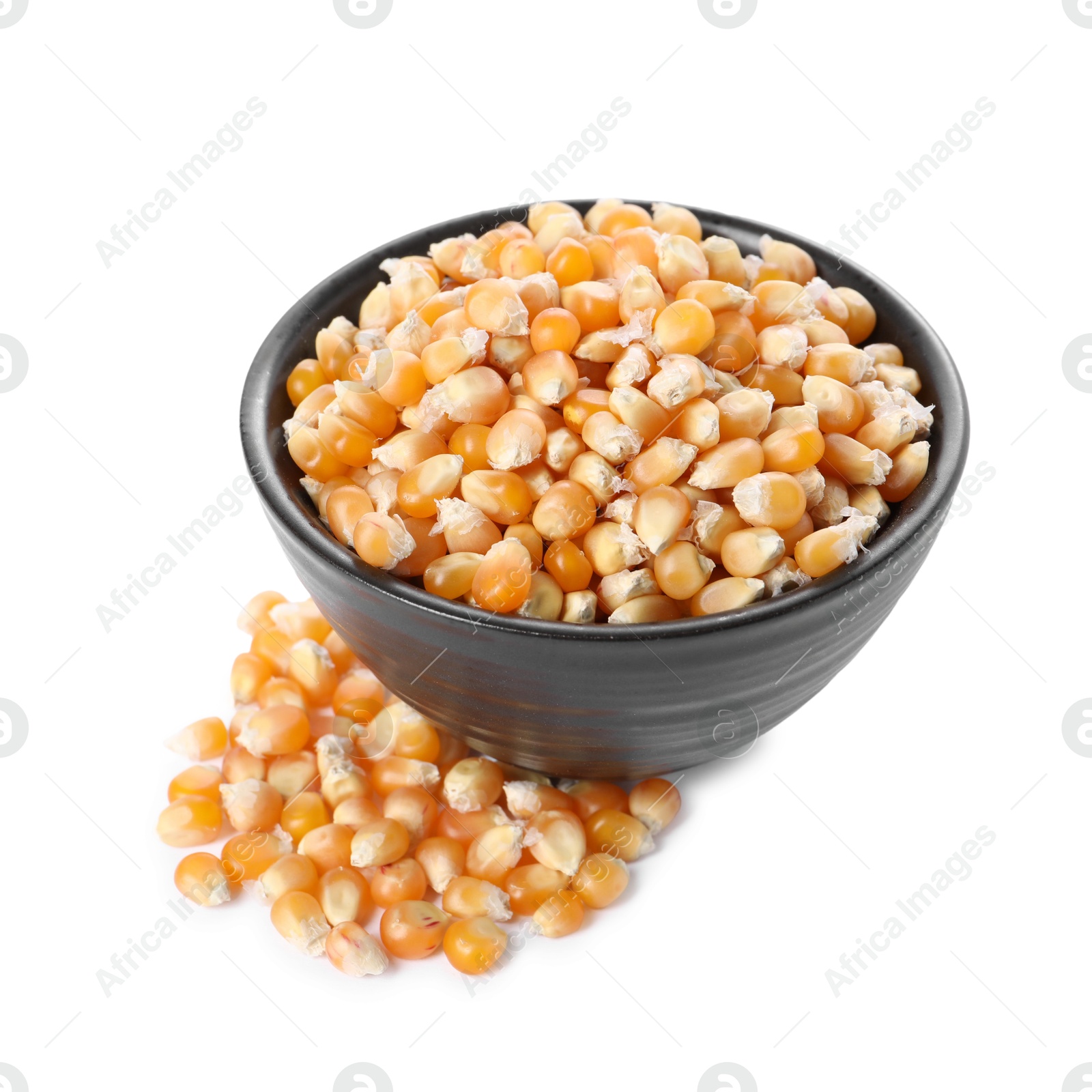 Photo of Fresh corn kernels in bowl isolated on white